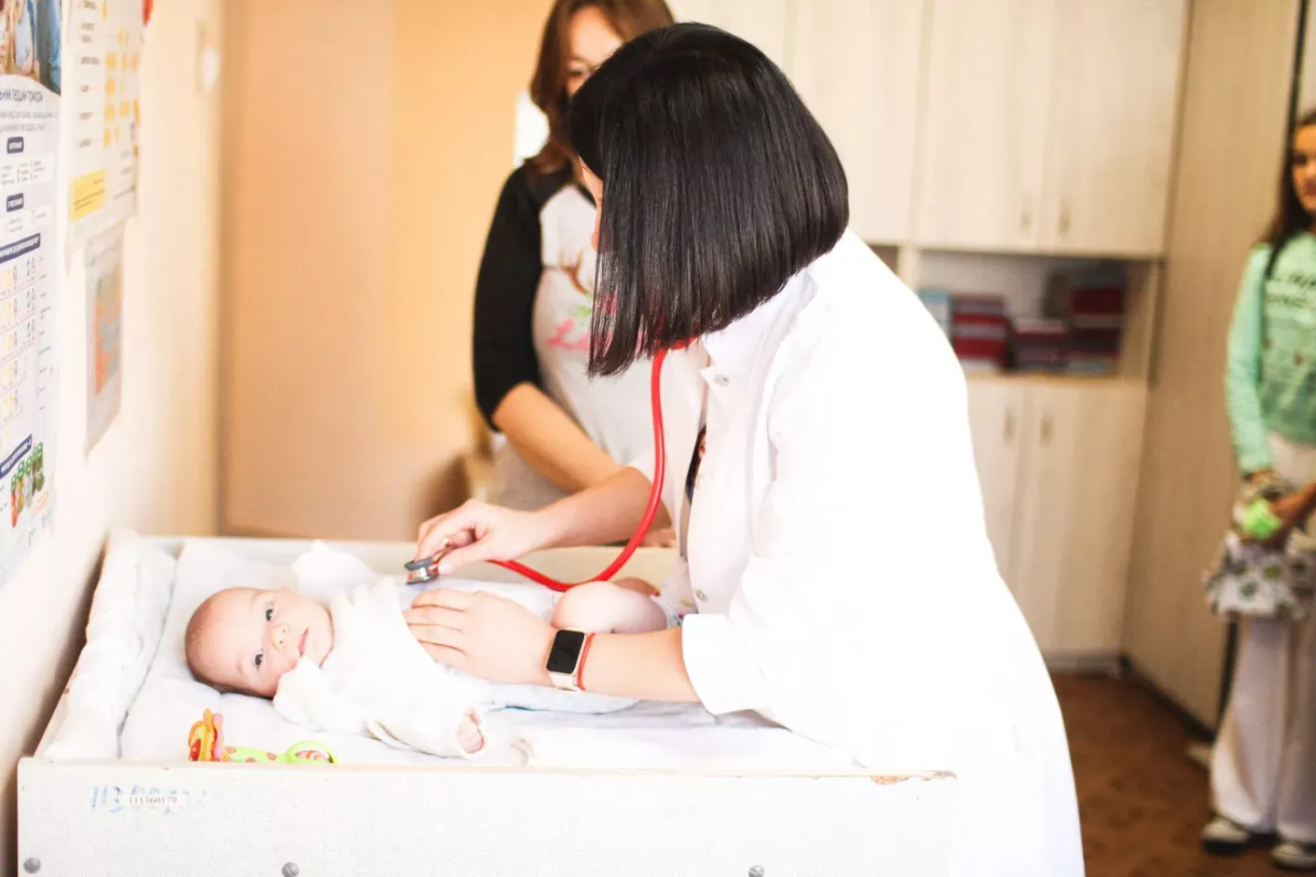 A doctor examines two-month-old Bohdan before administering the PENTA vaccine at a clinic in Sumy. The vaccine protects against five dangerous infections: diphtheria, tetanus, pertussis, hepatitis B, and Haemophilus influenzae type b (Hib).
