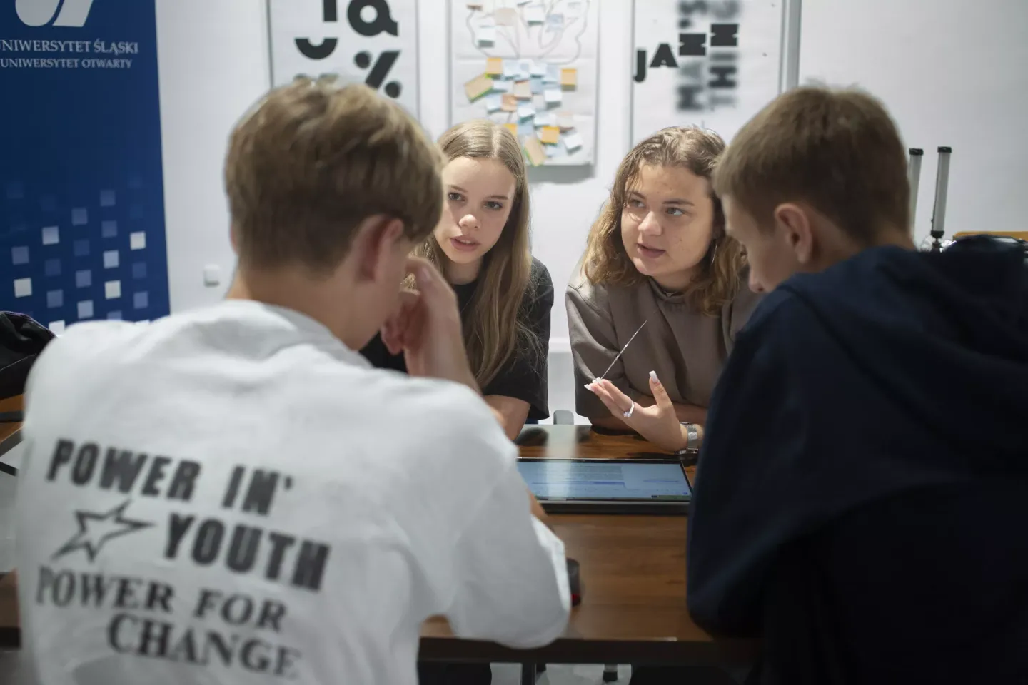 Youth from Ukraine with refugee experience work together during an in-person camp in Cieszyn, held at the Faculty of Education, University of Silesia. 