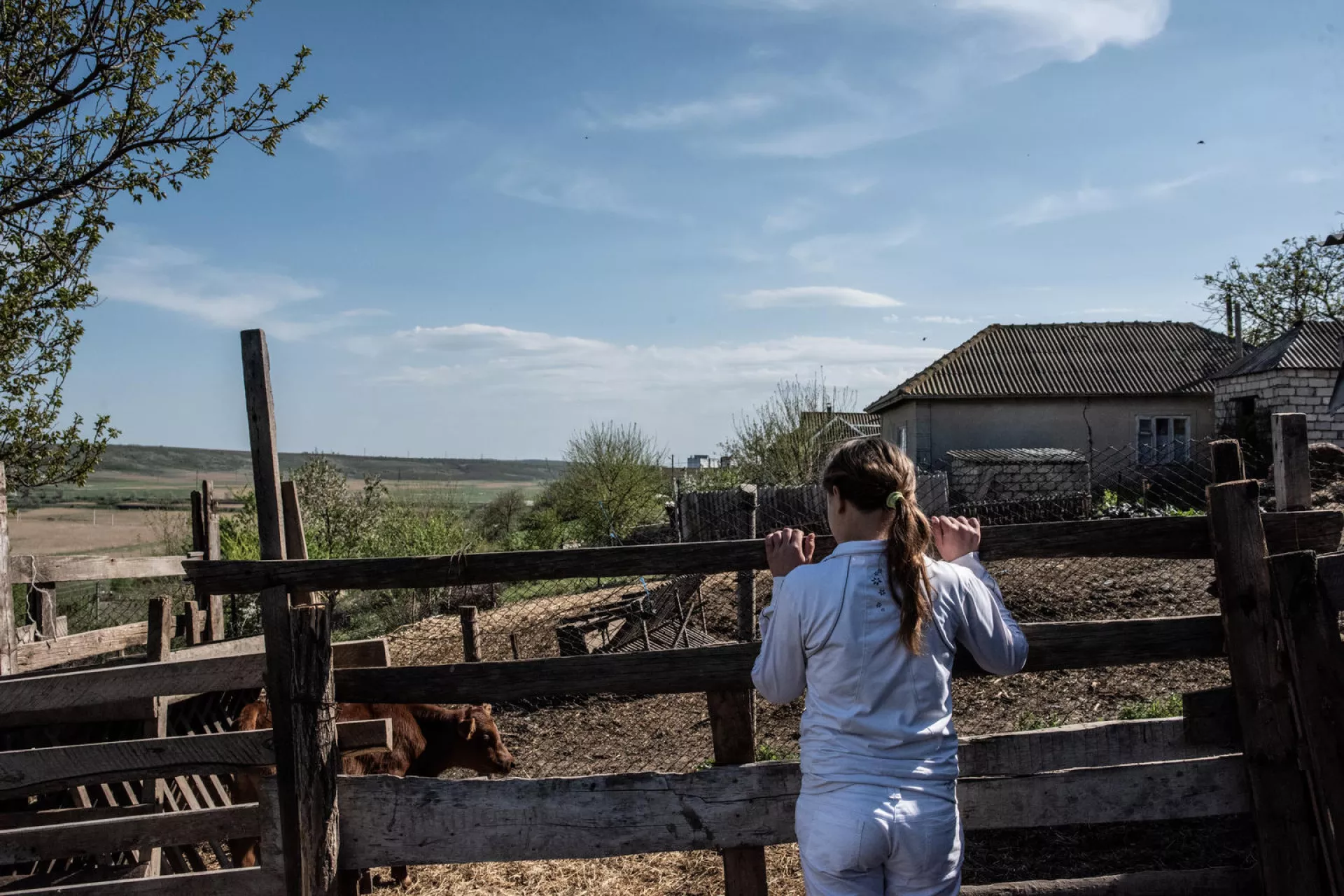 Liza, 12, in the backyard of her house in Moldova, on April 23, 2018.