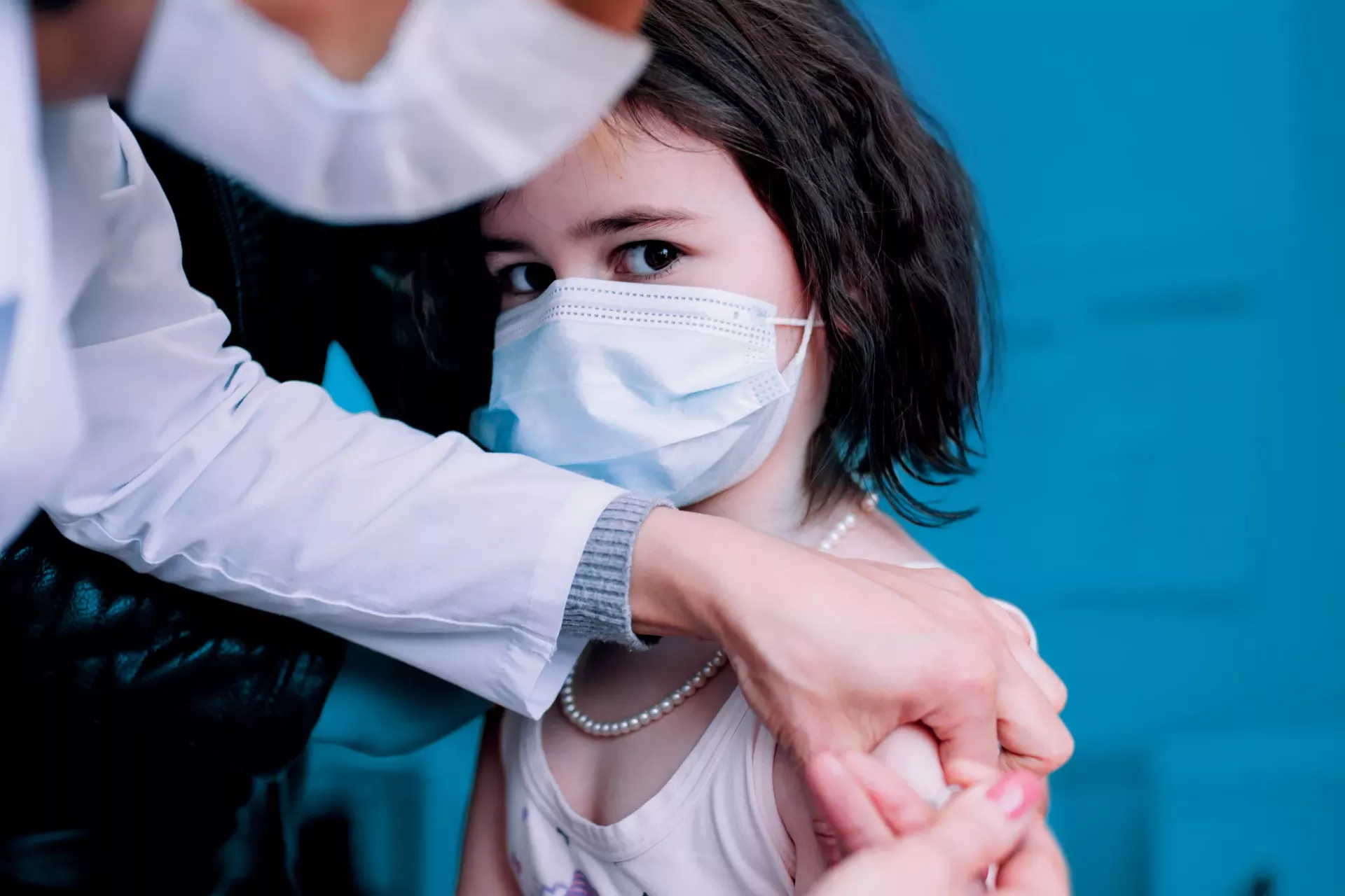 Arina, 6, is receiving her routine vaccination. at polyclinic #1 in Vanadzor.