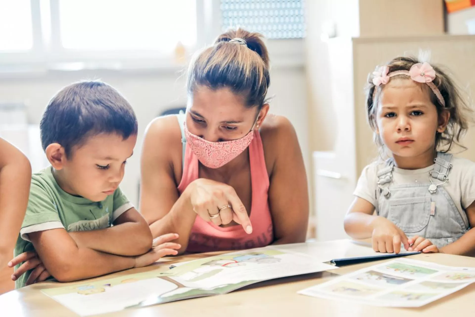 mother teaching children