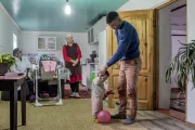 Father plays with child