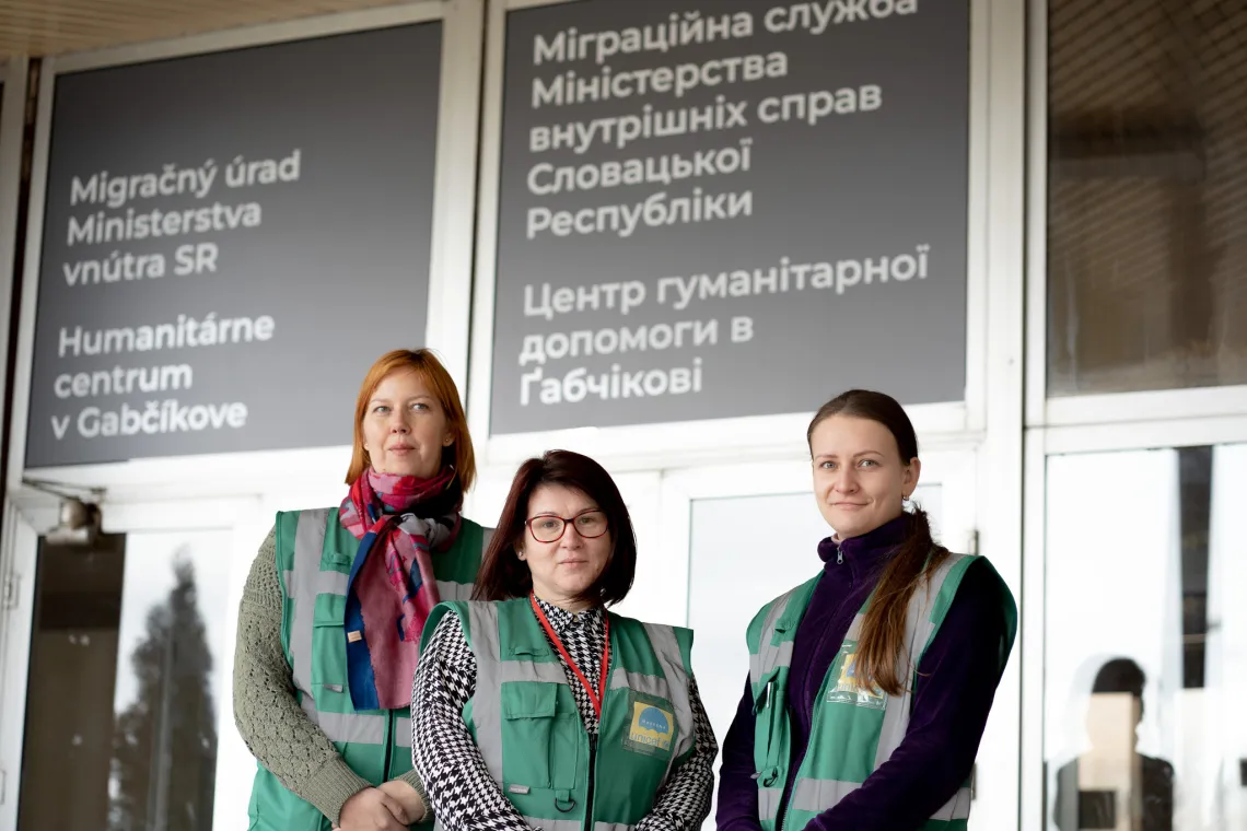 Social workers Katka, Melinda and Žaneta in front of the Humanitarian Center in Gabč&iacute;kovo.