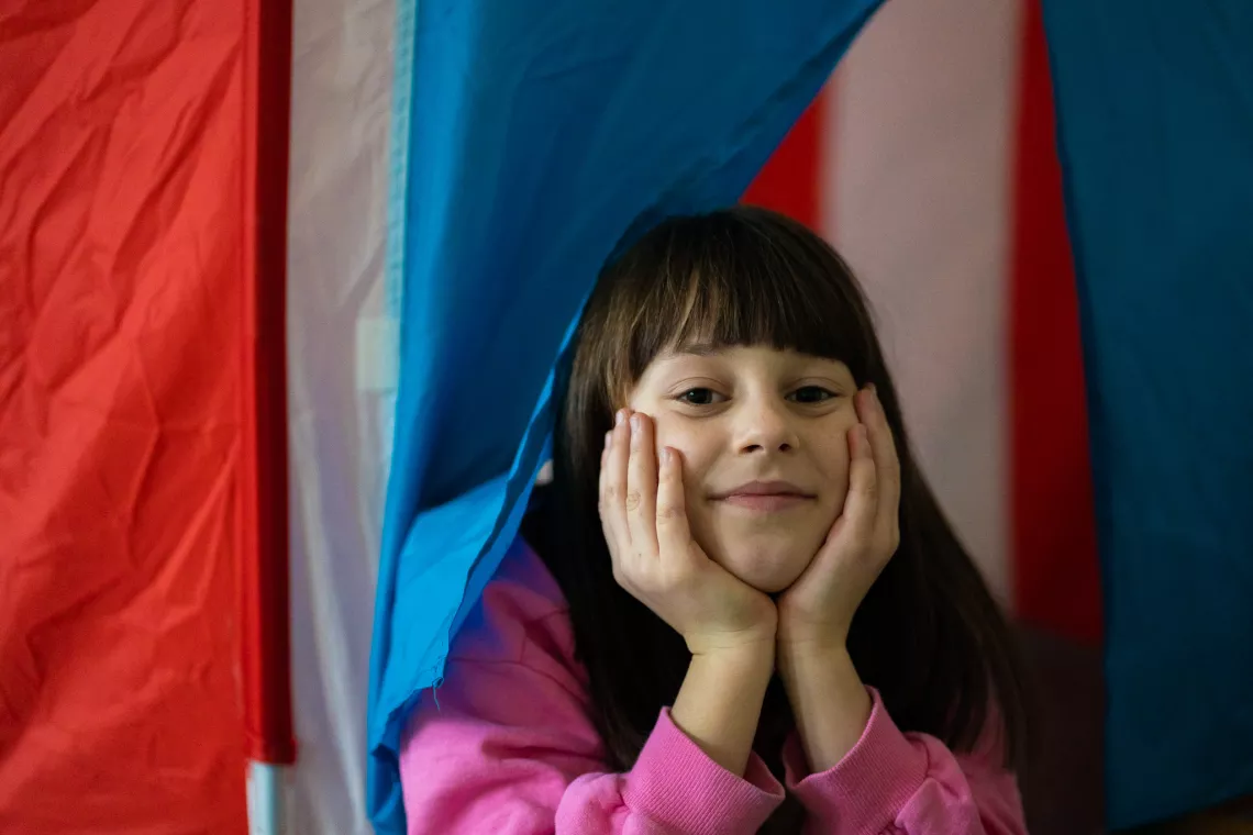 Anastasia is playing in the kindergarten room in Gač&iacute;kovo Humanitarian Center.