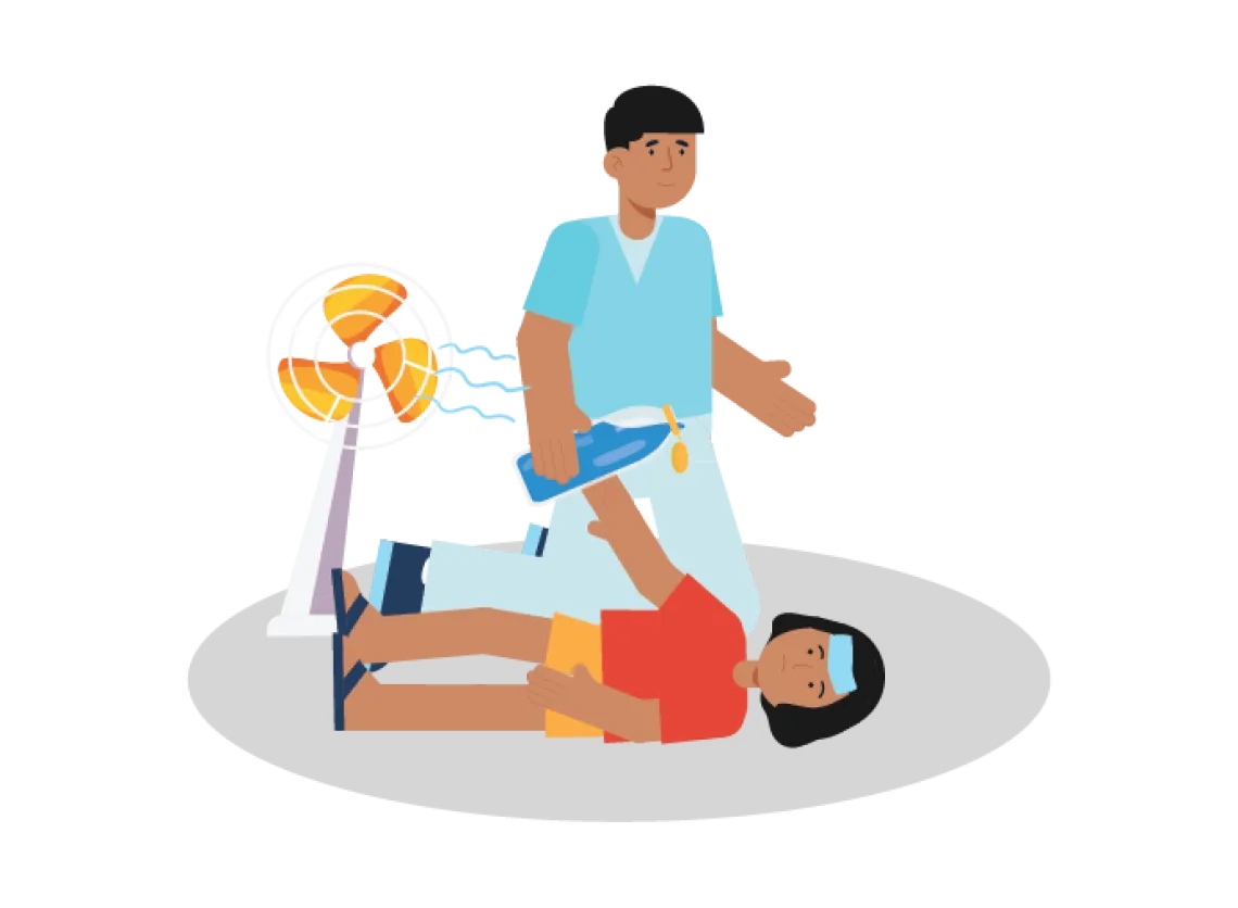 How to treat heat related illness: A girl lies on the floor while a caregiver provides water