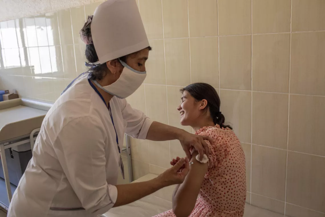 Girl receiving a HPV vaccine. 