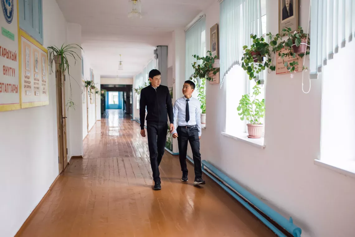 Salamat, 15 (left) and his best friend, Nursultan, 15, at Shabdan Baatyr school outside Shabdan village, Chon Kemin valley, Kyrgyzstan. July 2019.