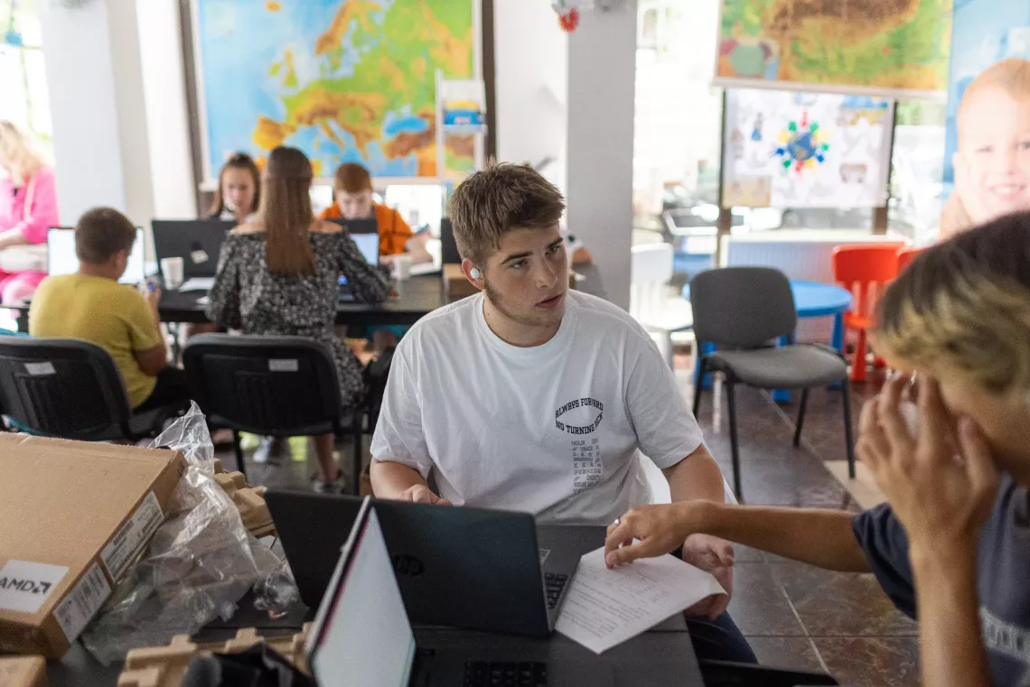 Ed, aged 16, at a UNICEF-supported hub in Galati, Romania. Ed came to Romania from Odessa in Ukraine in 2022, and his interest in technology led him to the hub&rsquo;s IT classes. July 2023.