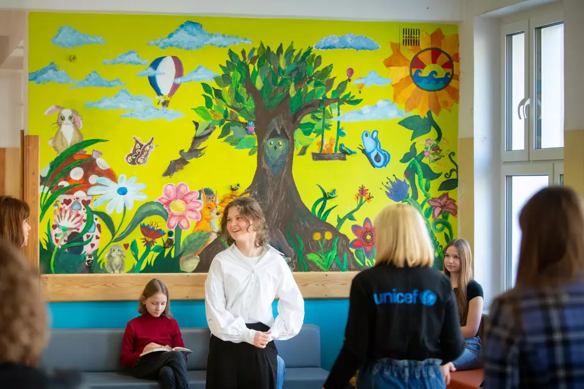Kseniia from Ukraine, Yan from Belarus and Julia from Poland - participants of the UPSHIFT programme at their primary school 258 in Warsaw.
