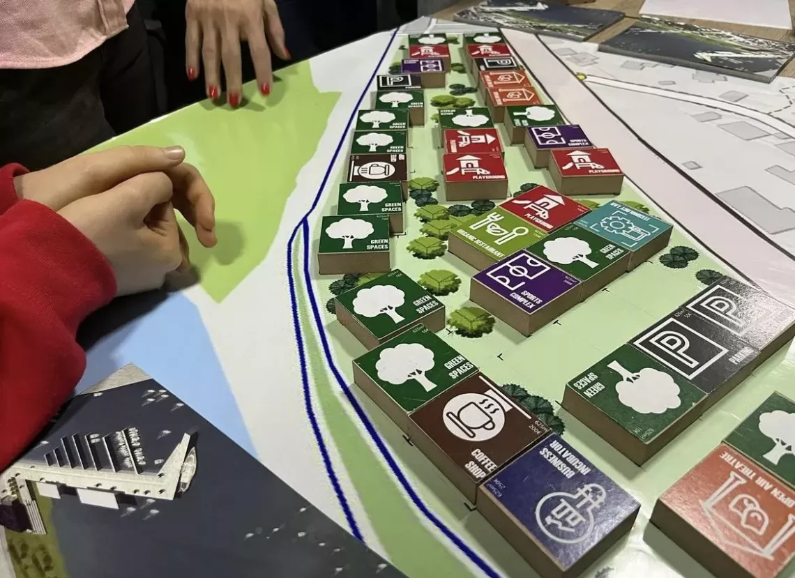 Young people play the board game Gamifying Shkodra
