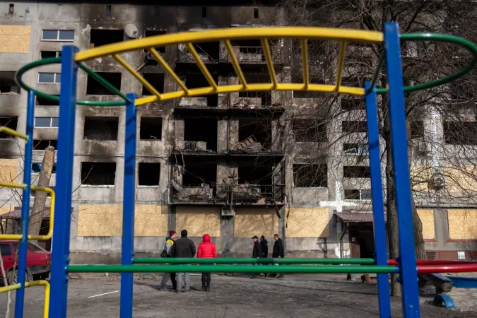 Dobropillia, eastern Ukraine. A burned-out residential building stands in stark contrast to the colourful playground in the foreground. The structure was heavily damaged by a missile strike on 7 March, which killed 11 people and injured 50 others, including seven children, according to Ukraine&rsquo;s State Emergency Service.