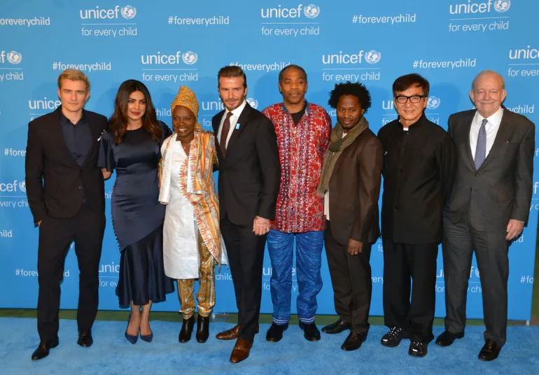 UNICEF Goodwill Ambassador Orlando Bloom, UNICEF National Ambassador for India Priyanka Chopra, UNICEF Goodwill Ambassador Ang&eacute;lique Kidjo, UNICEF Goodwill Ambassador David Beckham, UNICEF Goodwill Ambassador Femi Kuti, UNICEF Goodwill Ambassador Ishmael Beah, UNICEF Goodwill Ambassador Jackie Chan and UNICEF Executive Director Anthony Lake walk the &lsquo;blue carpet&rsquo; at the UNICEF 70th anniversary celebration event at UNHQ.