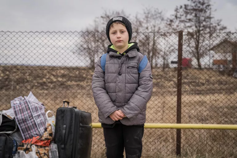 Seven years old David from Chernivtsi, Ukraine, was accompanied across the Romanian border on February 27, 2022, by his grandmother.