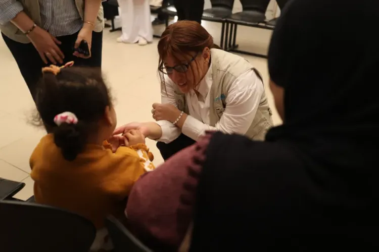 A child with a caregiver