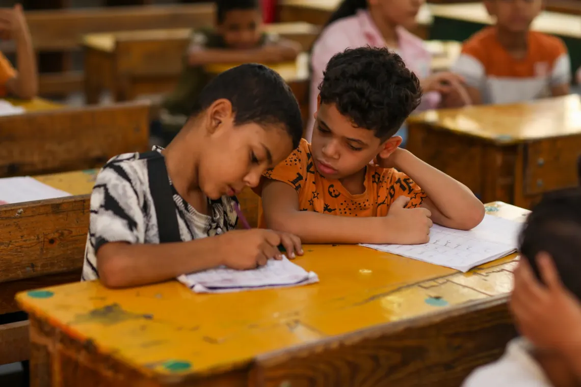 Two boys in a classroom