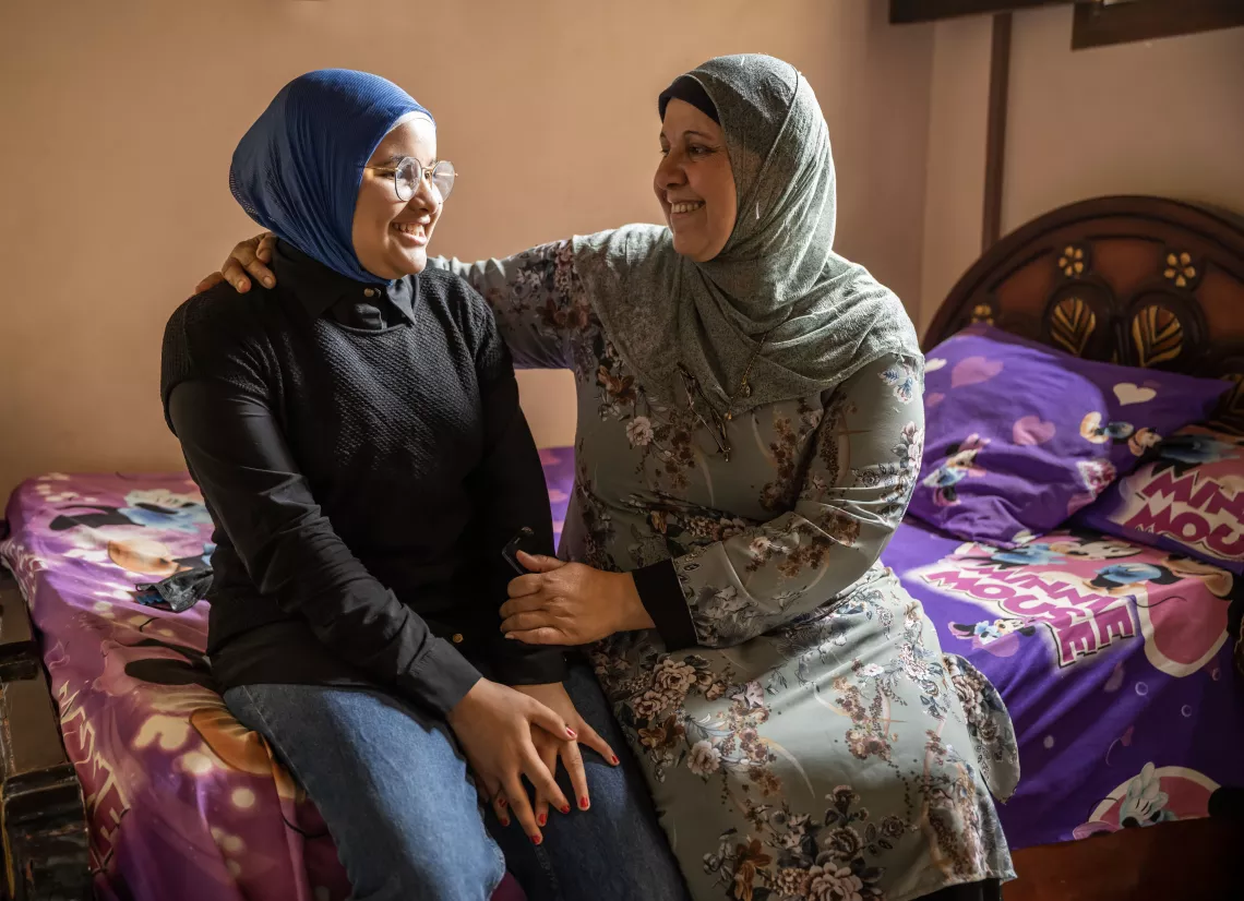 mother and daughter sitting 