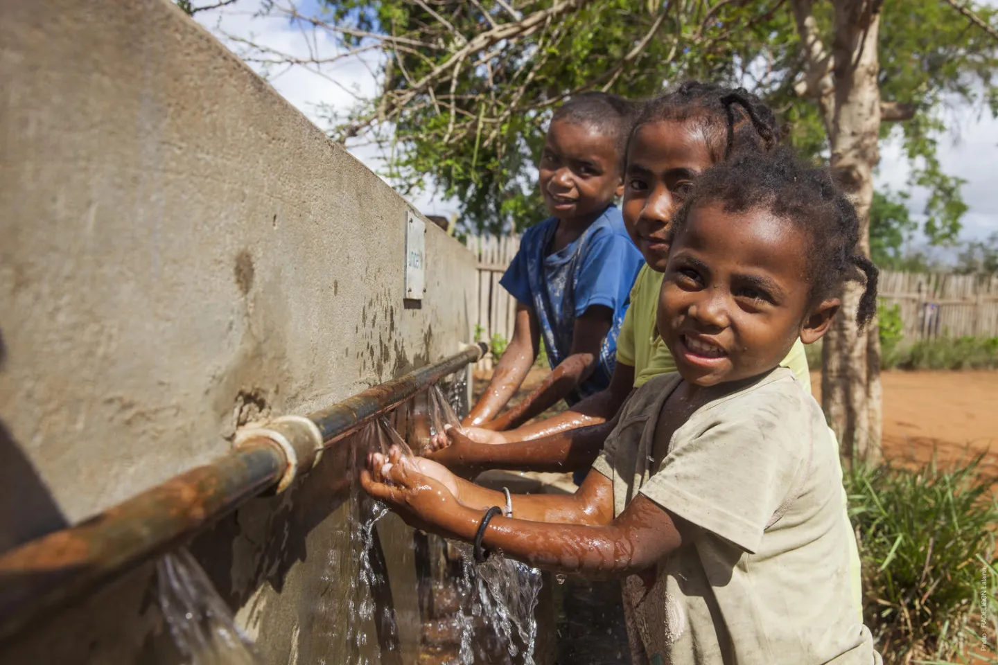 Children wash their hands