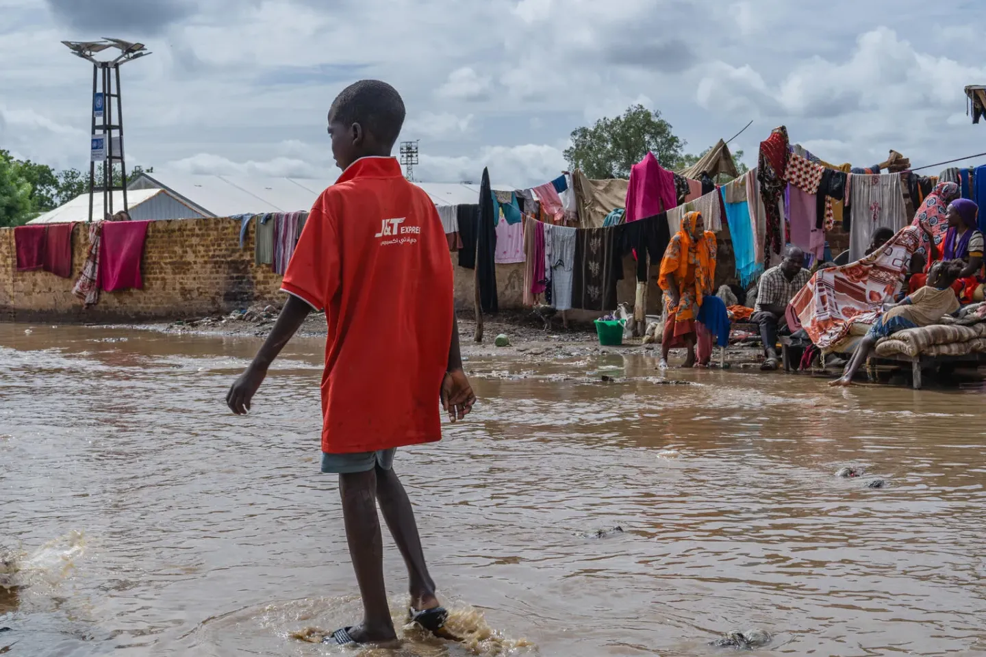 On 26 July 2024, displaced children, and families at the industrial school in Kassala state, suffer the impact of heavy rains and flooding.