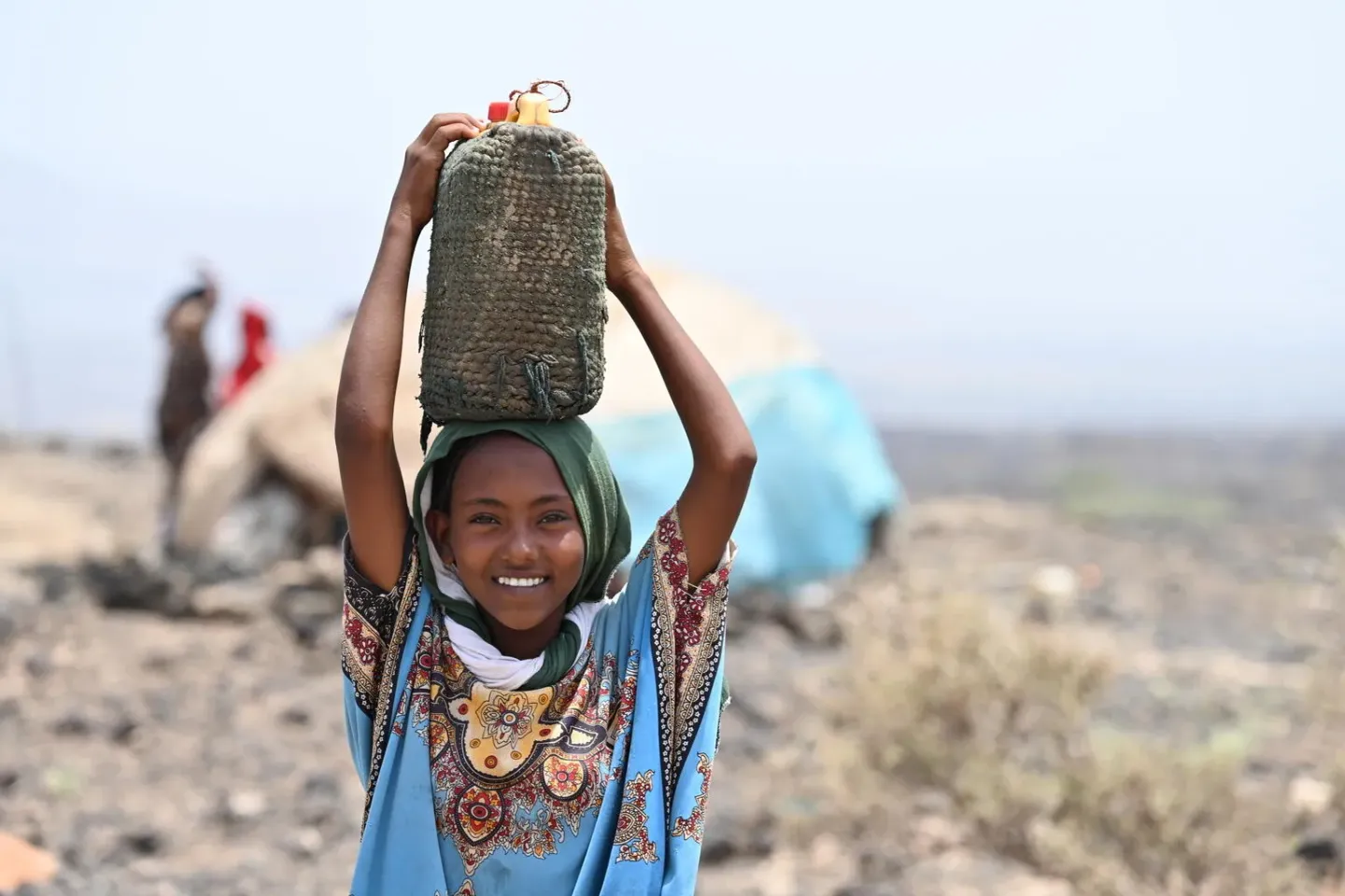 A child carries water, in Daba, in northeastern Ethiopia.