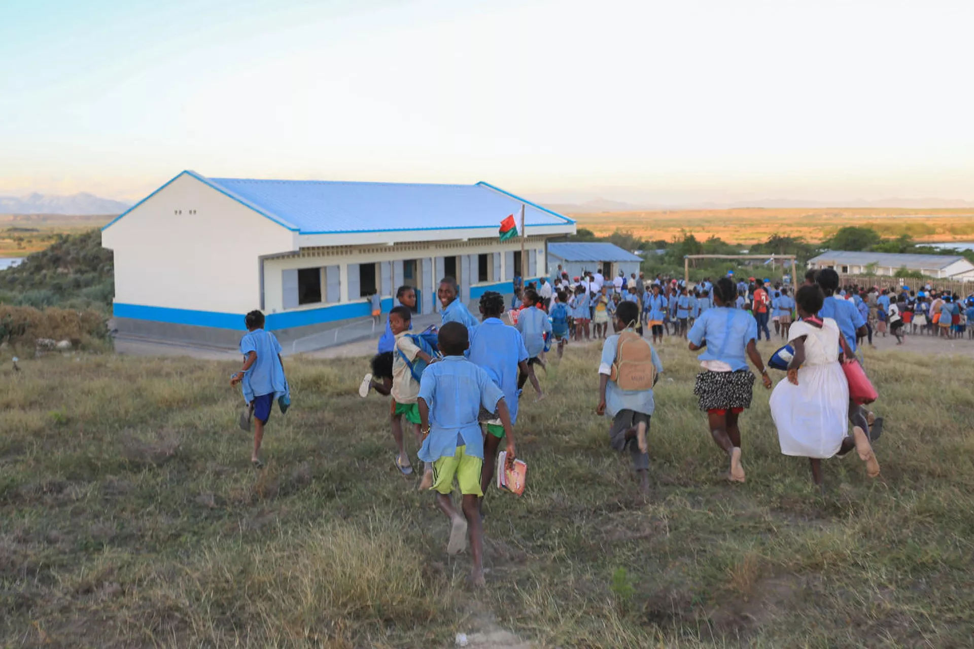 Children running to go to the new classroom in secondary school of Berano, Madagascar.