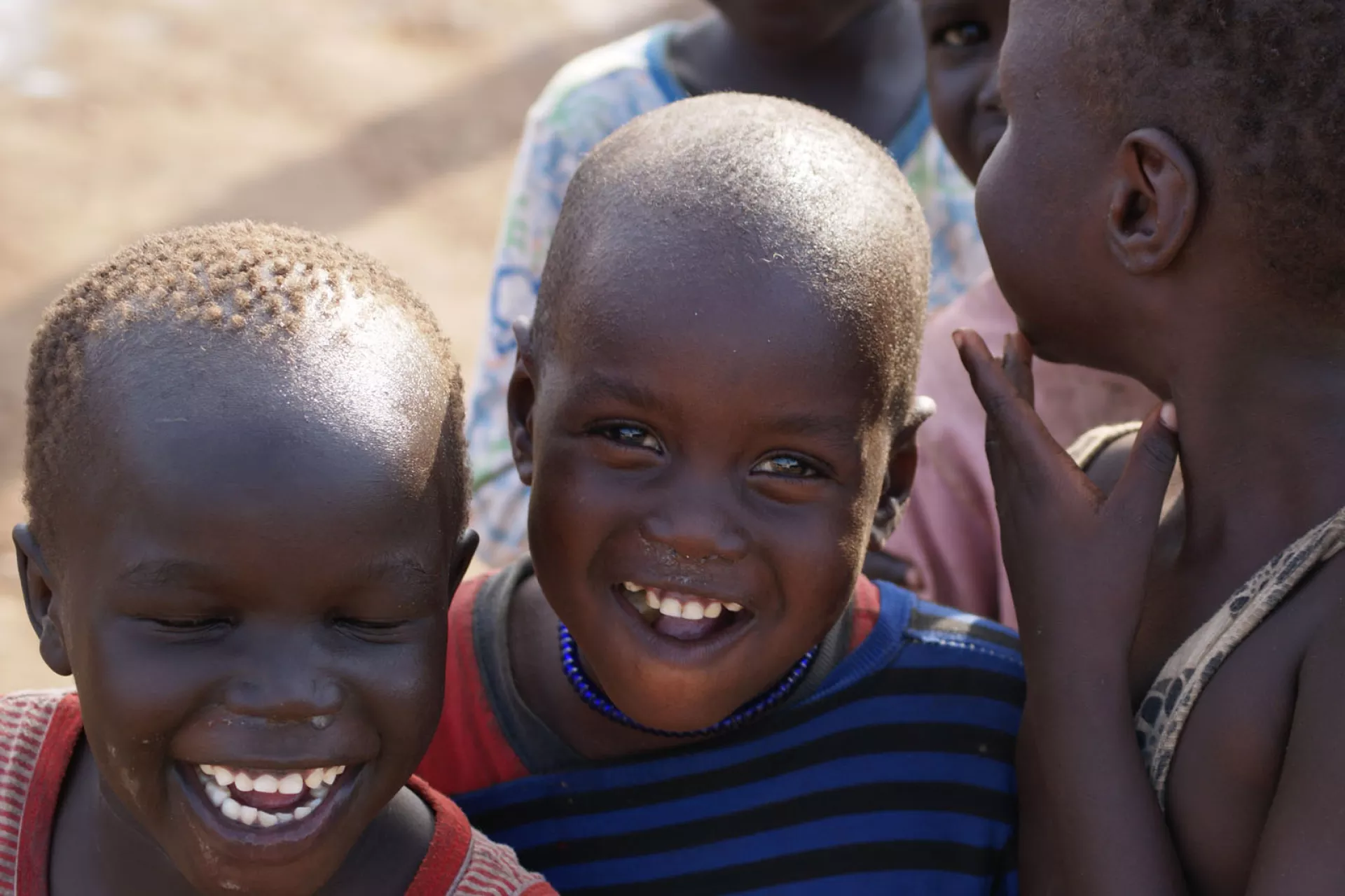 Children in South Sudan smiling and laughing