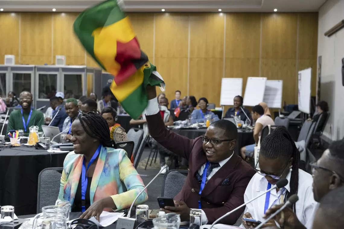 Ntombikayise Ncube and participants smile during the UNITED! Leadership summit 