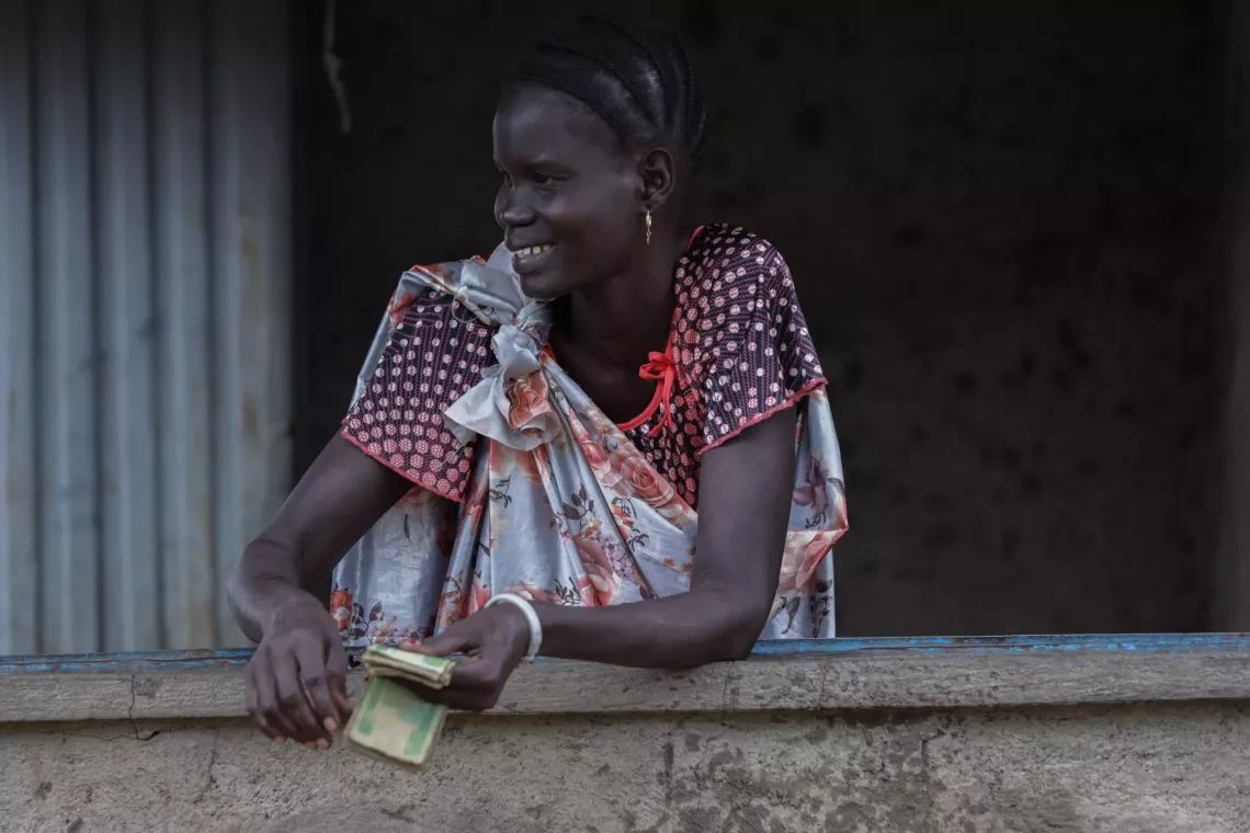Nyayong Koang is a water kiosk operator in Itang, Gambella region, Ethiopia. Every morning women come to fetch water paying a small amount of money. Nyayong also makes a living selling water while serving her community. 