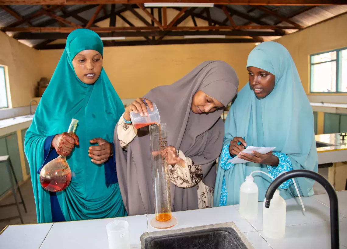Girls conducting a chemistry experiment