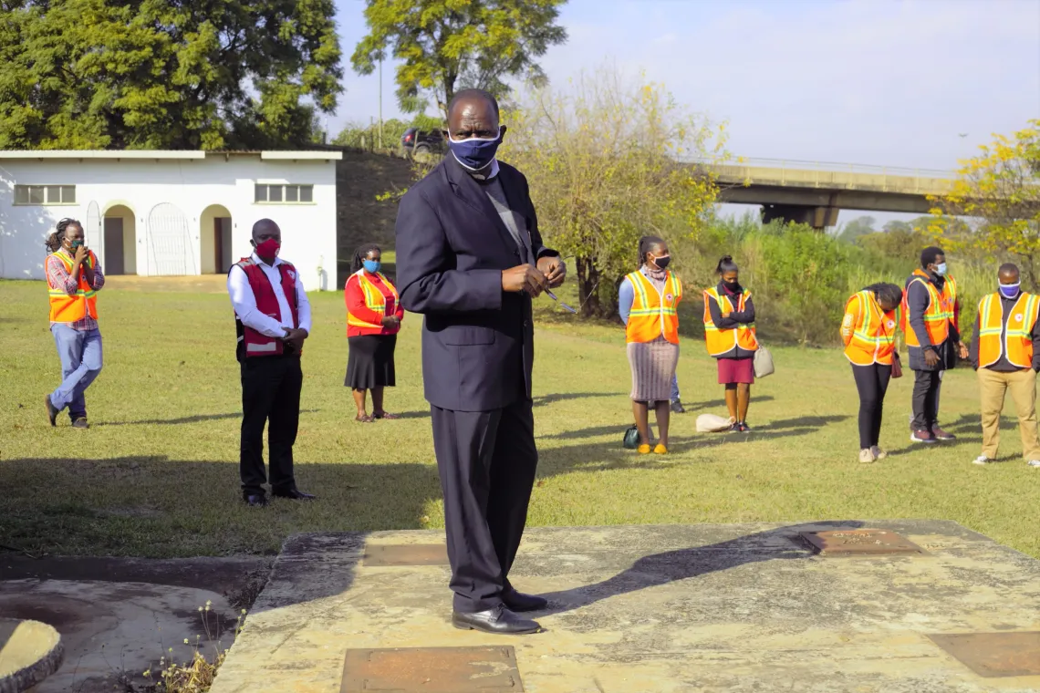 Man standing before a group of people 