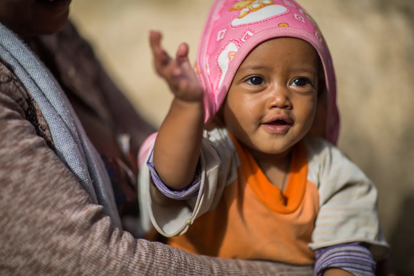 A child waits for a nutritious porridge made from locally available products.  &copy;UNICEF Ethiopia/2016/Sewunet