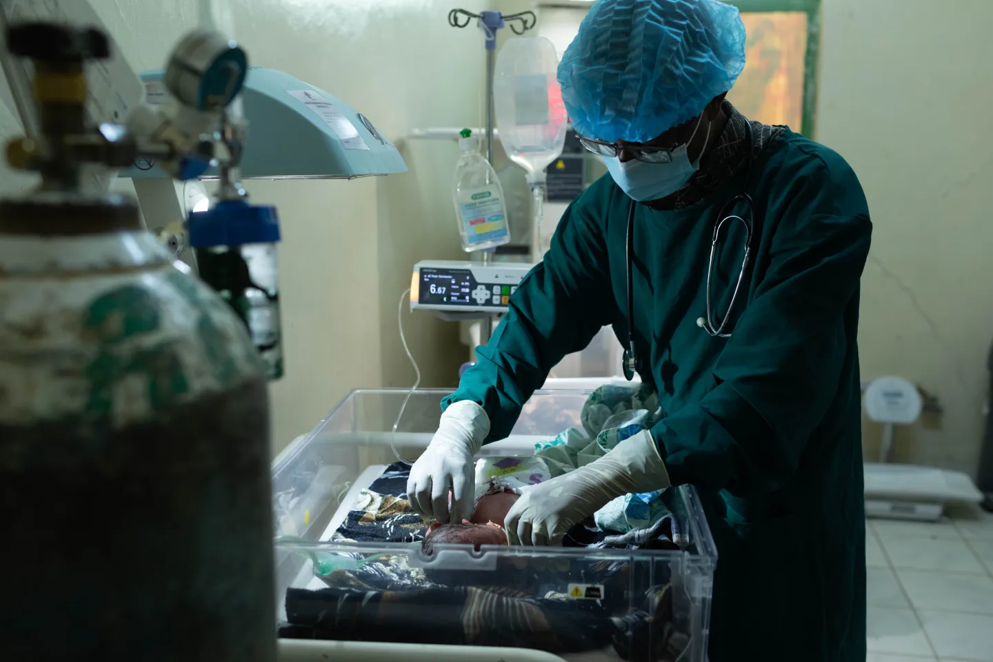 Doctor with newborn baby