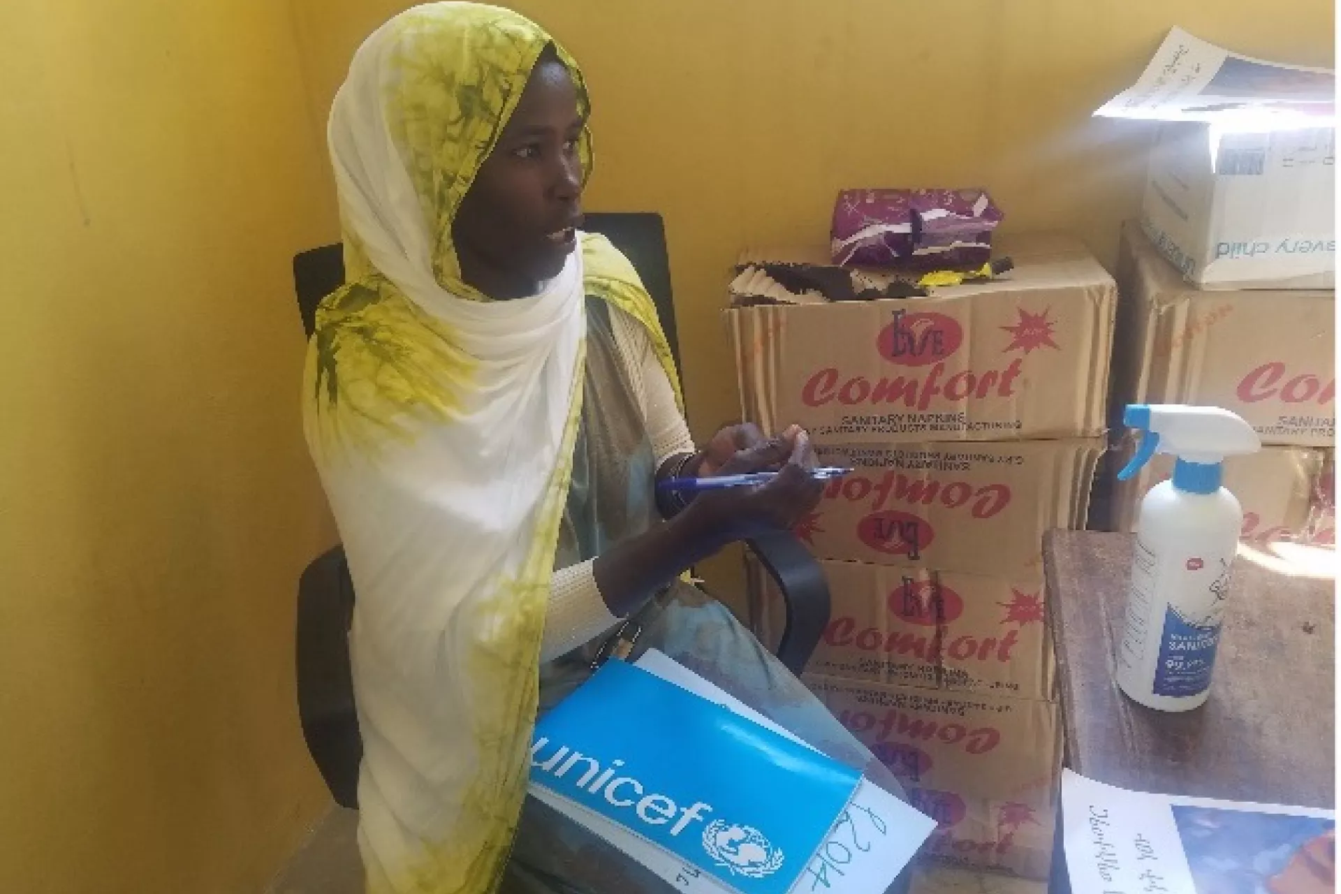 Halima Abdulahi, 23, gender club coordinator, carrying out MHH session to club members