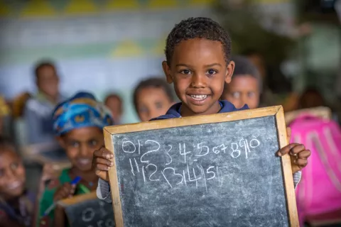 Abel Chane, 6, is happy to show his writing skills to the class. Abel will be in grade 1 next year acquiring critical educational and social skills which will help him succeed further.  Despite the proven and lifelong benefits, more than 175 million children – nearly half of all pre-primary-age children globally – are not enrolled in pre-primary education. In low-income countries, the picture is bleaker, with only 1 in 5 young children enrolled. 