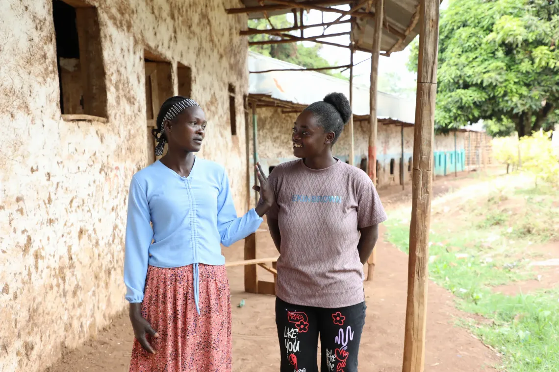 Meskerem walking and talking with her mother, Asegedech
