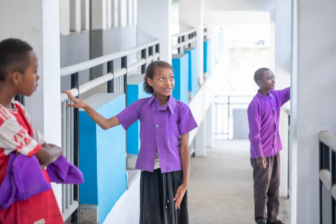 Selam Tamirat, 11, a 4th grader, standing in her school hallway 