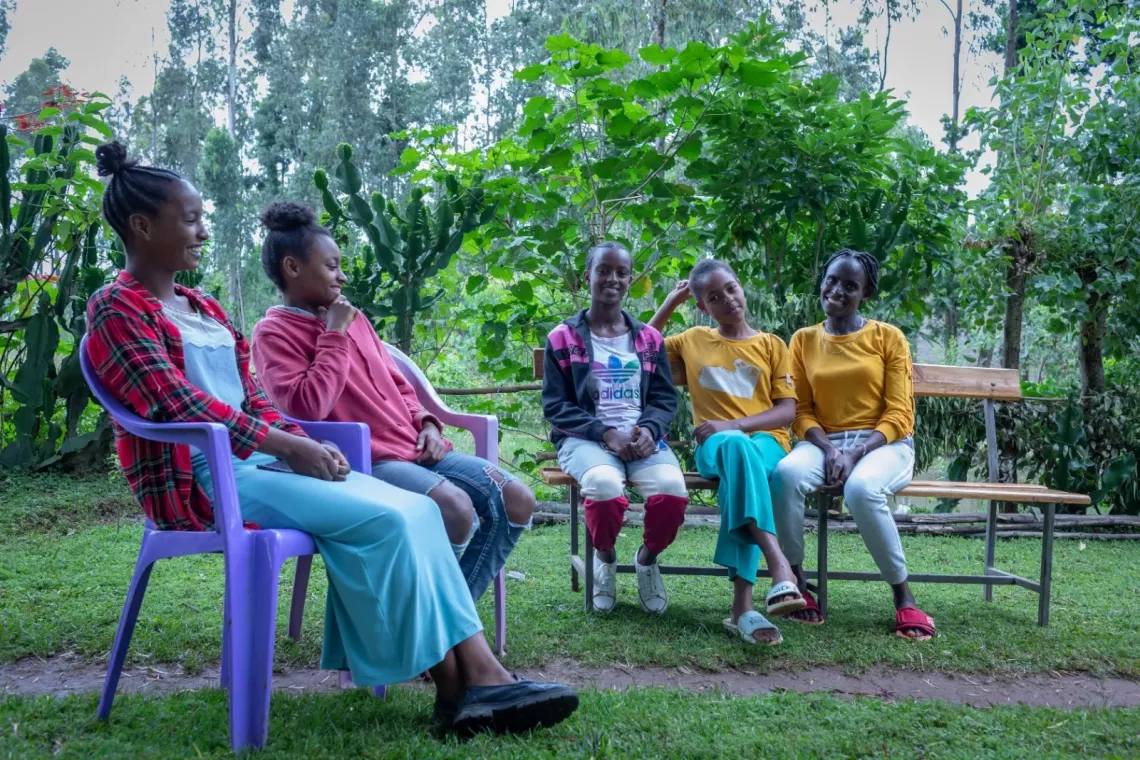 Adolescent girls holding girls forum