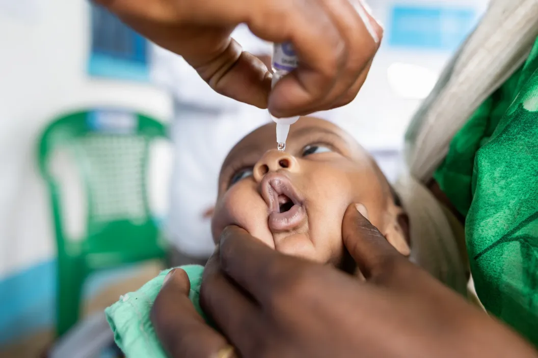 A close up photo of a child being vaccinated against polio