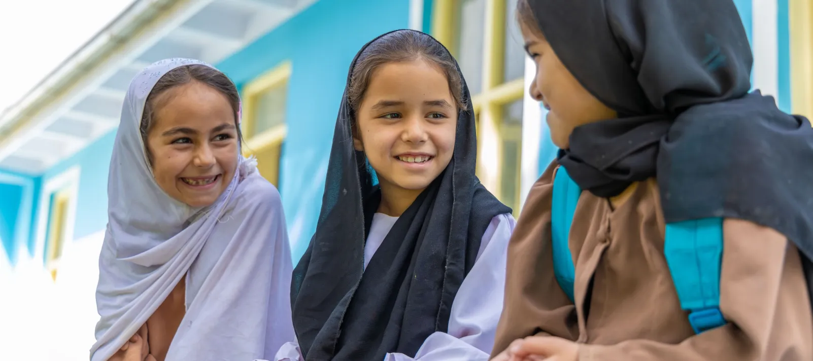Girls outside their newly renovated classroom, Afghanistan