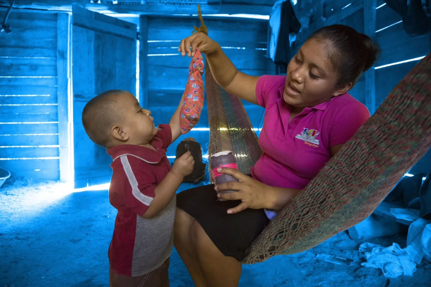 On 14 August 2016 in Belize, Abner Choc, 2, and Melisha, a facilitator from the Roving