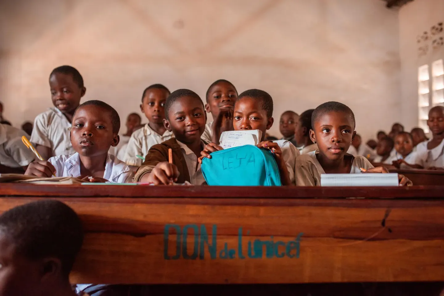 Students sit in their classroom at Wamunda Primary School, supported by UNICEF in Kalemie, Tanganyika Province, DR Congo, on 12 October 2025.