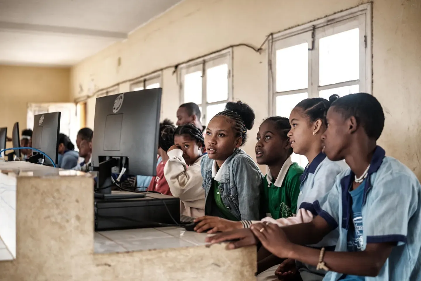 At CEG R&eacute;f&eacute;rence, a lower secondary school in Taolagnaro, Anosy region, Madagascar, students are seen discovering their new computer room for the first time.