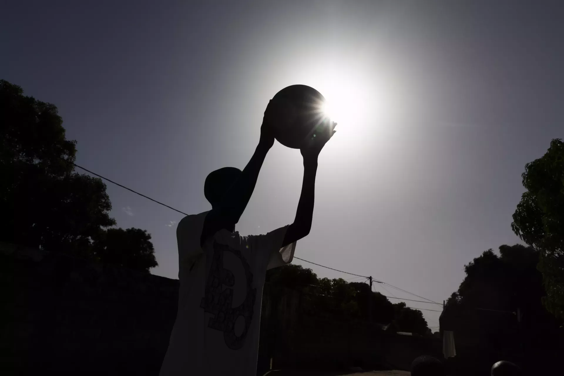A Majilist student plays with a ball at a Majilist school in Farafenni.