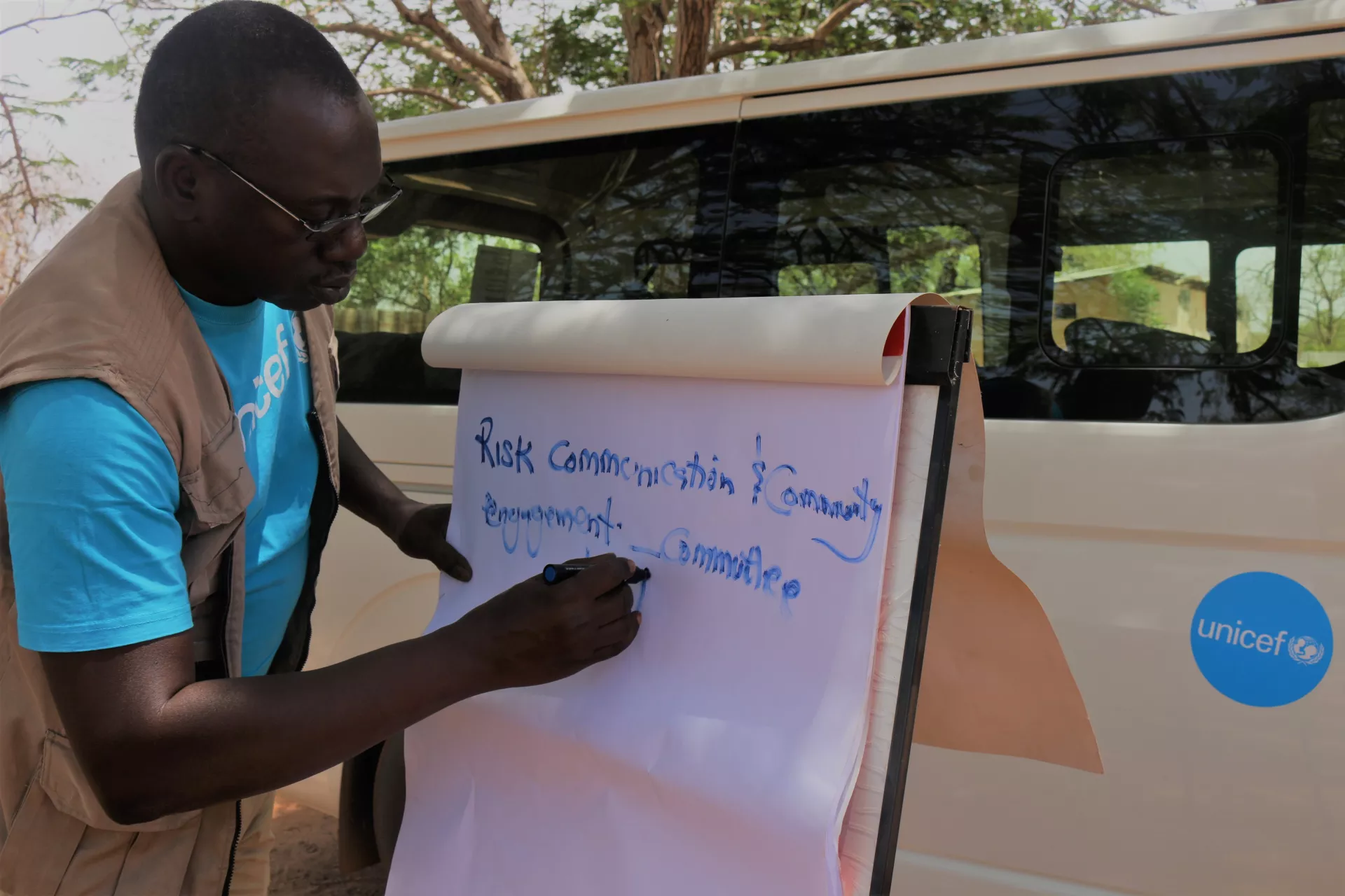UNICEF staff trains communities on risk communication