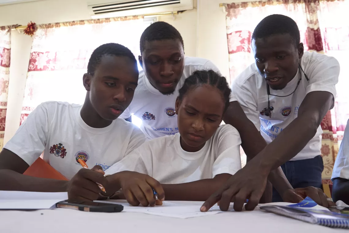 Children discussing child rights in transitional justice process