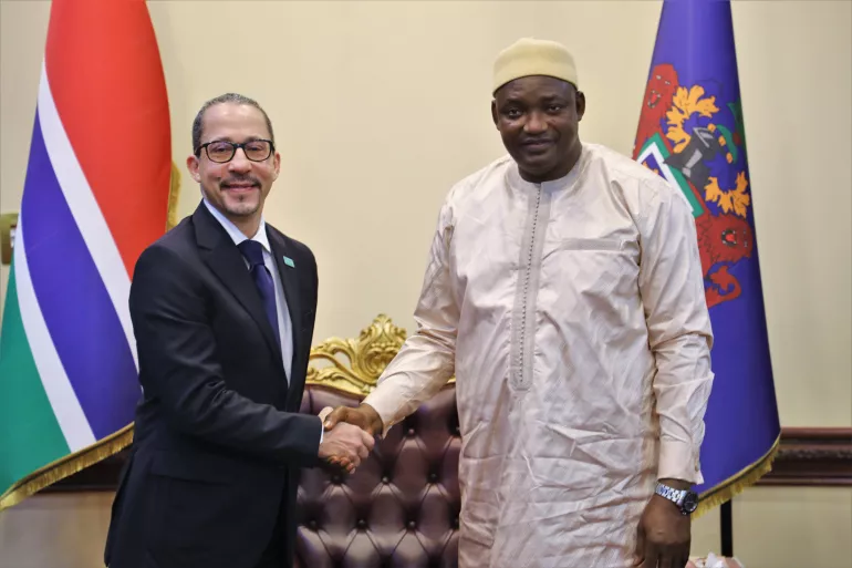 UNICEF Representative and President of The Gambia pose for a photo after a meeting.