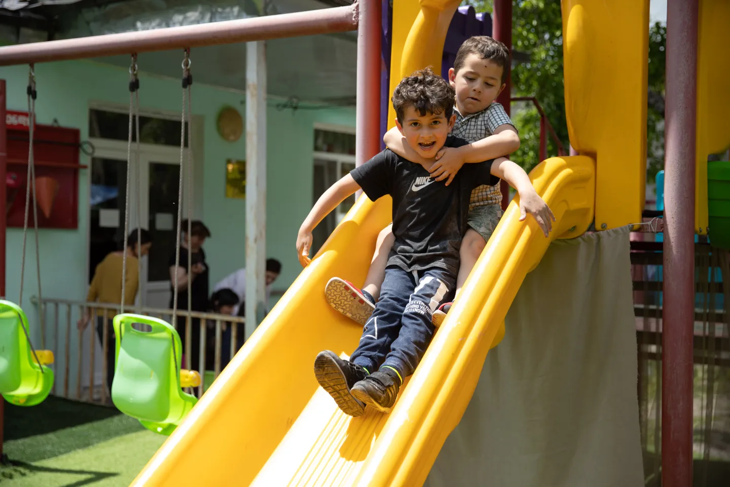 Children playing at the yard of kindergarten
