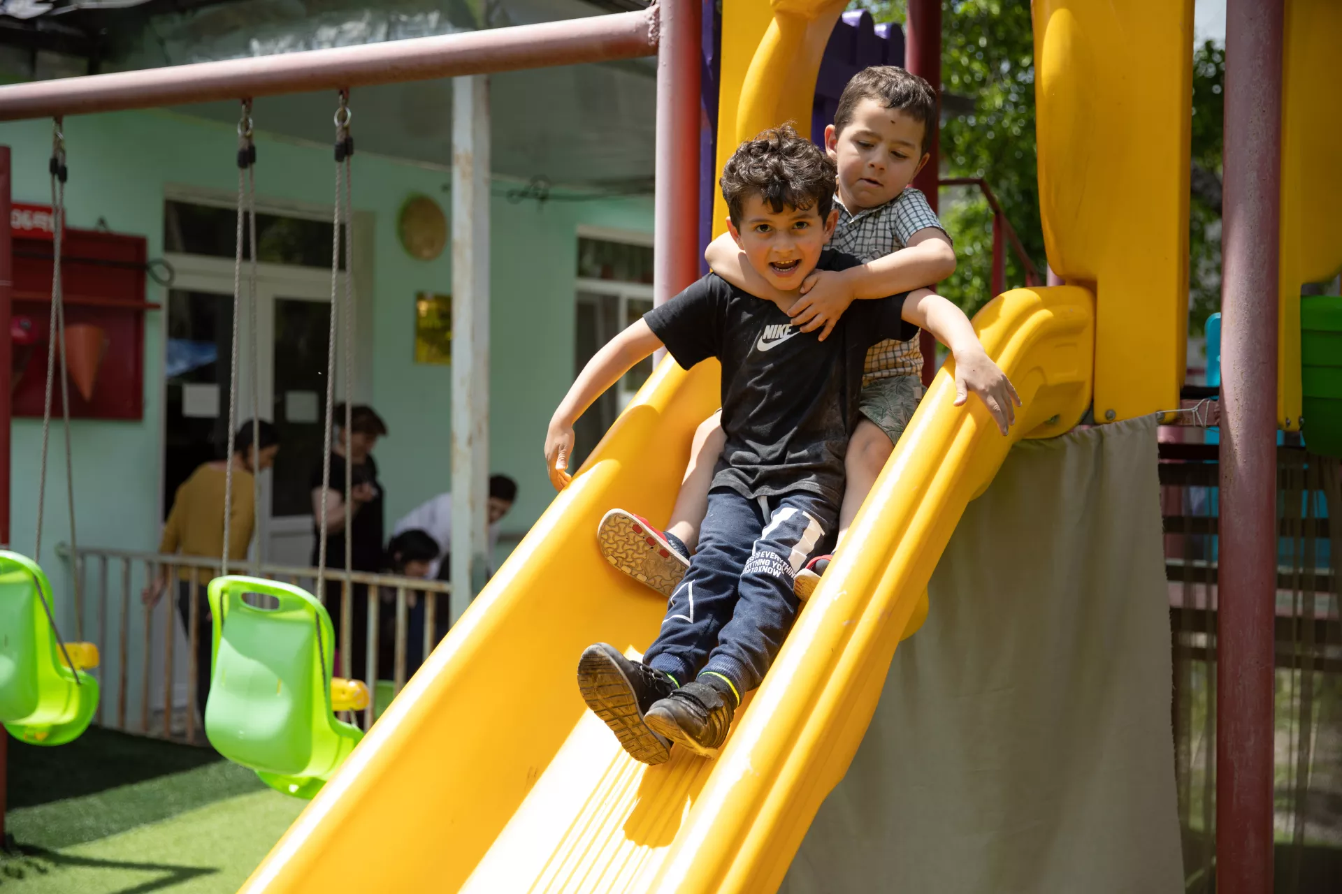Children playing at the yard of kindergarten
