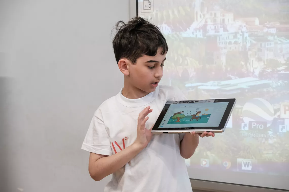 Nikoloz shows his work