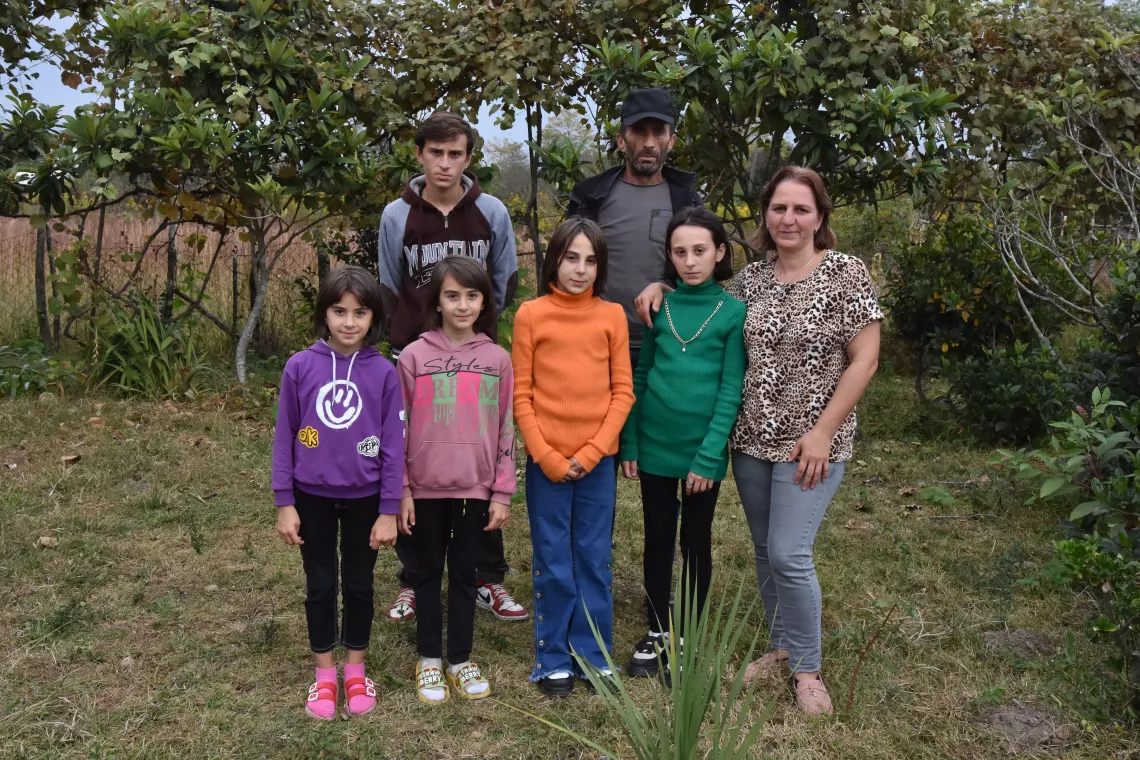 Gulnazi, 43-year mother of 5 children with her family