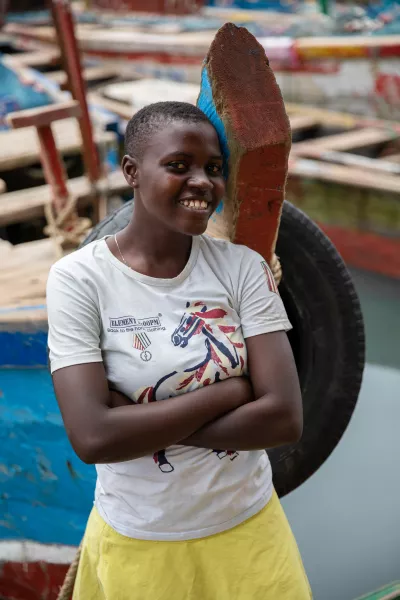 Esther, 18, poses for a picture at the shore